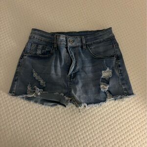 Cute blue ripped jean shorts